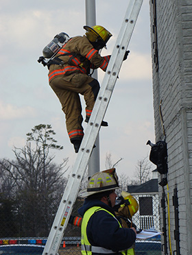 Firefighters at a residential fireground experiment